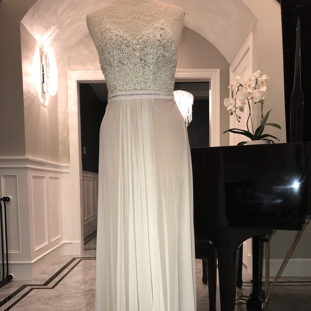 Faviana dress delicately done